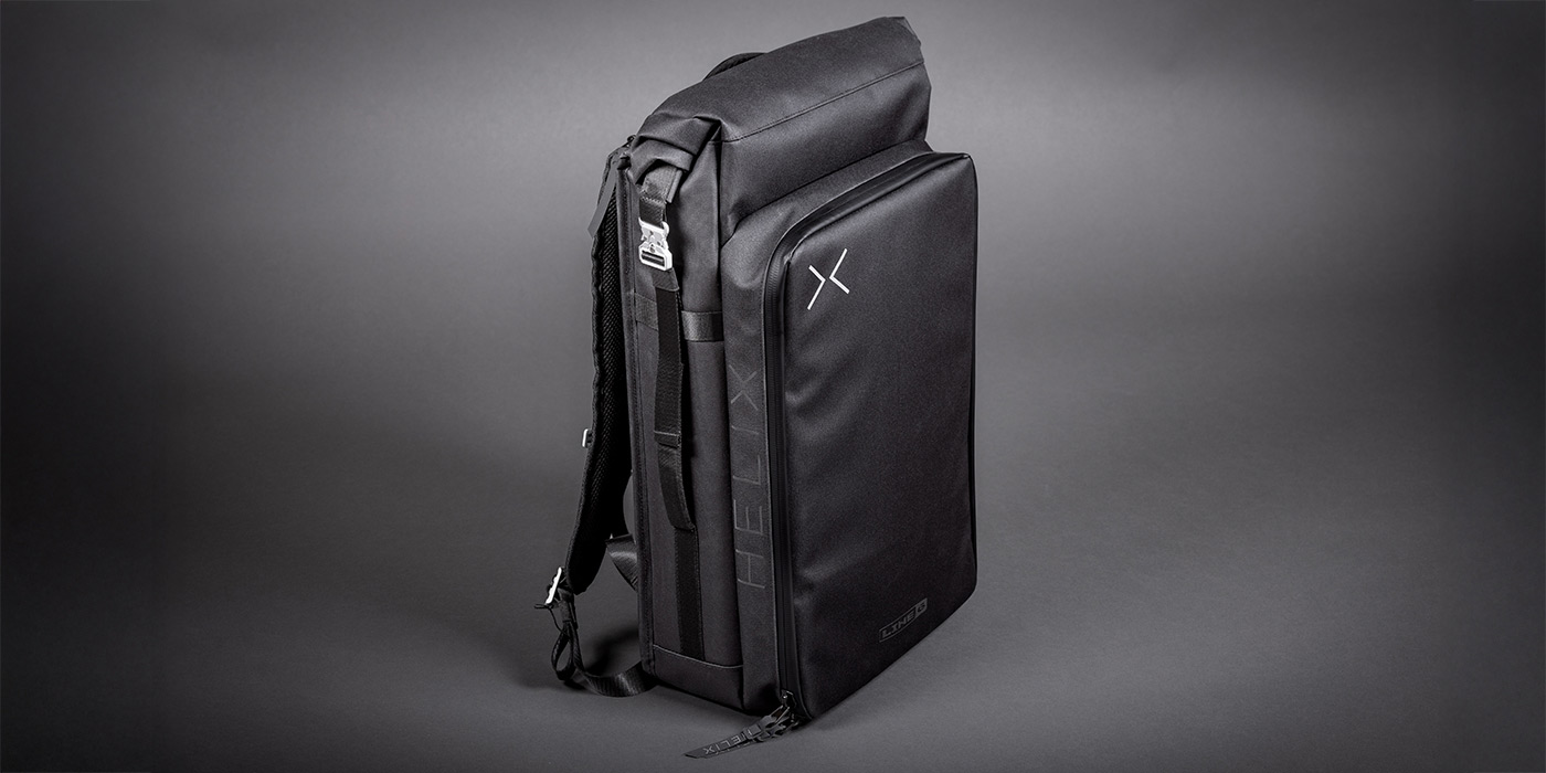 Side view of the Helix Stadium Backpack featuring the Helix logo