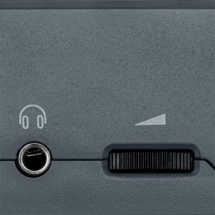 Close up of headphone input and volume control